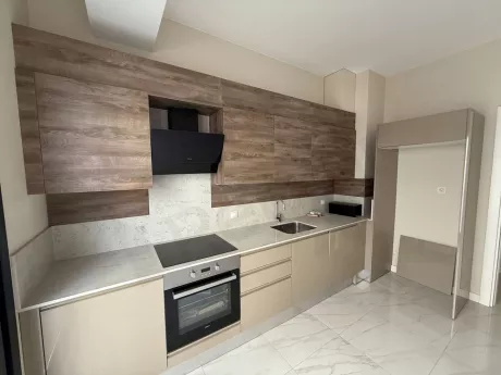 Bright and spacious kitchen area of a modern 3+1 apartment.