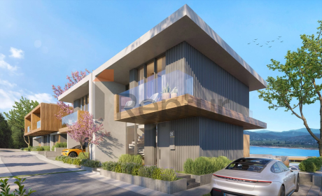 Contemporary style villas overlooking the reserve and lake with flamingos.