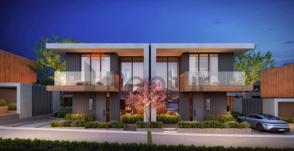 Contemporary style villas overlooking the reserve and lake with flamingos.