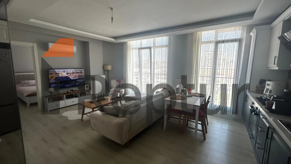 Modern design 1+1 apartment with large windows in the central area of Istanbul for sale
