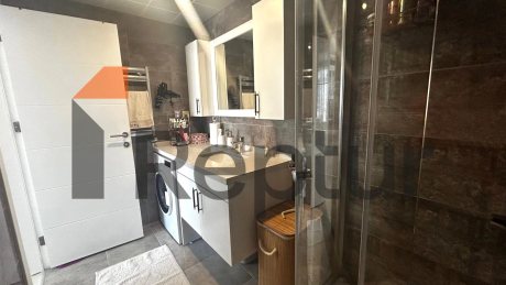 Modern design 1+1 apartment with large windows in the central area of Istanbul for sale