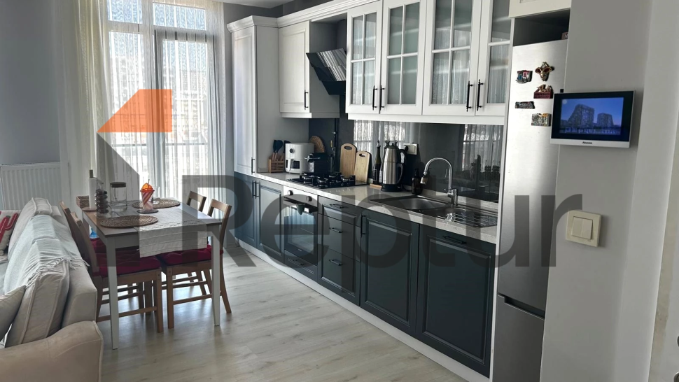 Modern design 1+1 apartment with large windows in the central area of Istanbul for sale