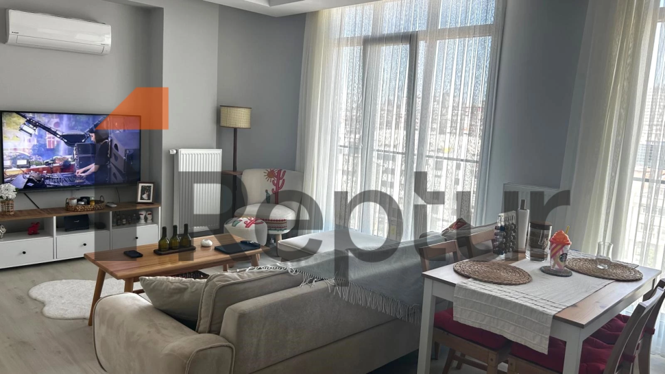 Modern design 1+1 apartment with large windows in the central area of Istanbul for sale