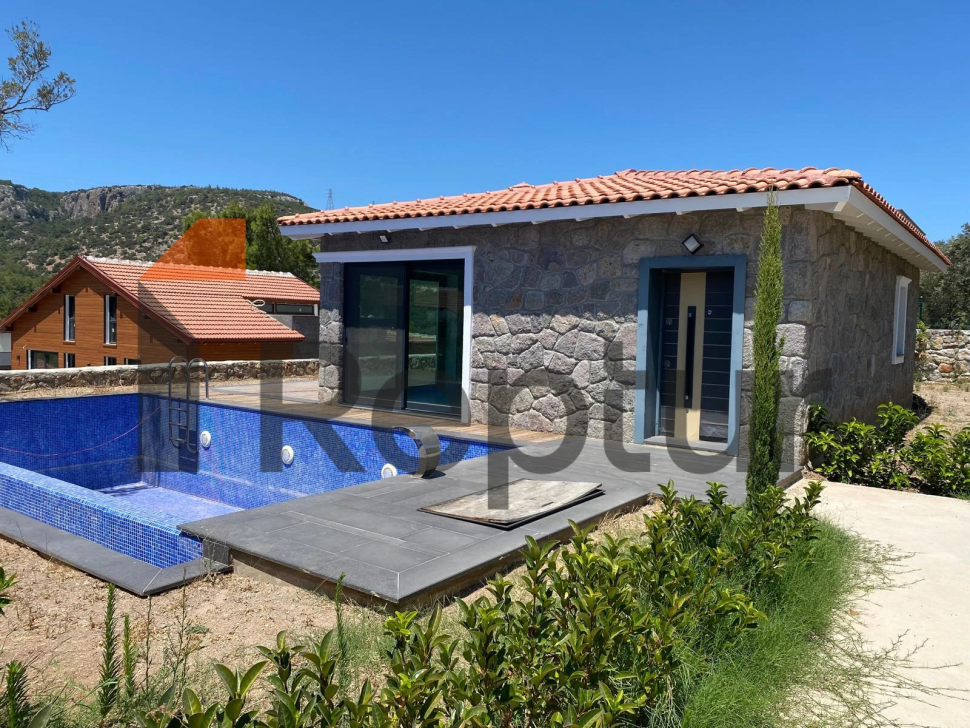 Cottage in a modern interior made of natural stone in Bodrum