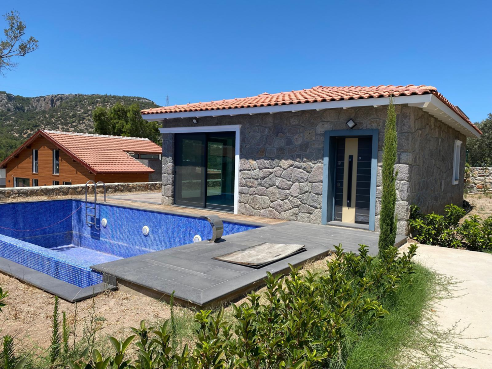 Cottage in a modern interior made of natural stone in Bodrum
