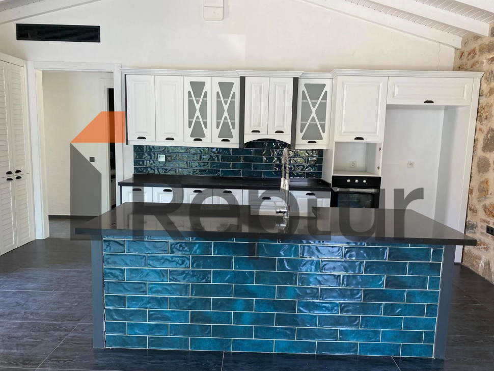 Cottage in a modern interior made of natural stone in Bodrum