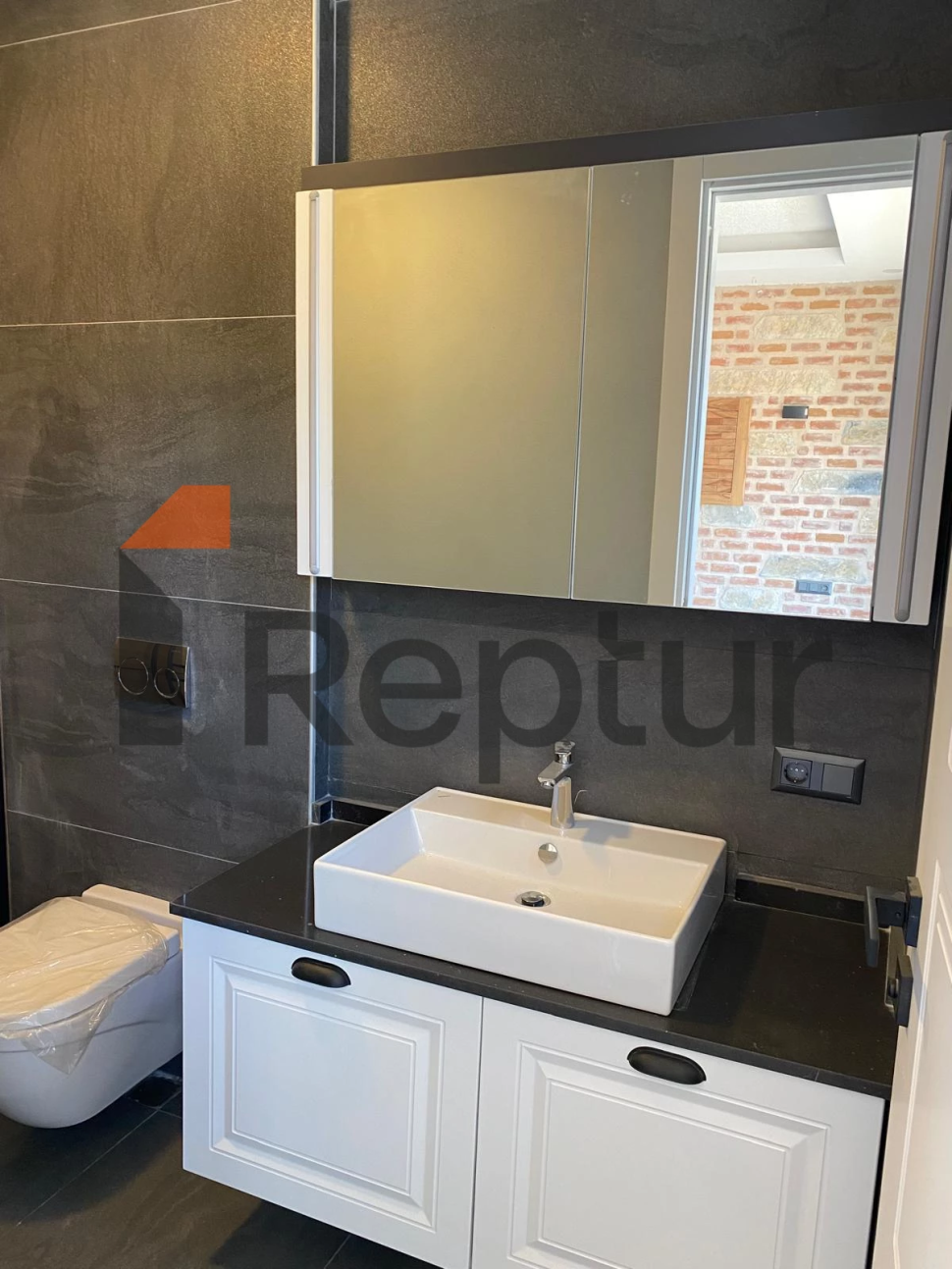 Cottage in a modern interior made of natural stone in Bodrum