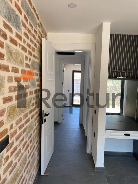 Cottage in a modern interior made of natural stone in Bodrum