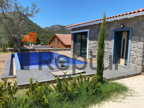 Cottage in a modern interior made of natural stone in Bodrum