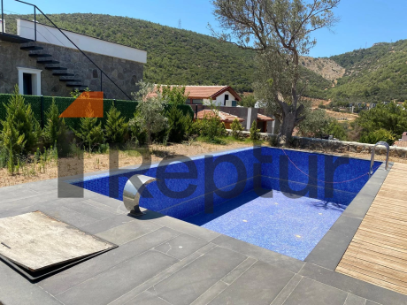 Cottage in a modern interior made of natural stone in Bodrum