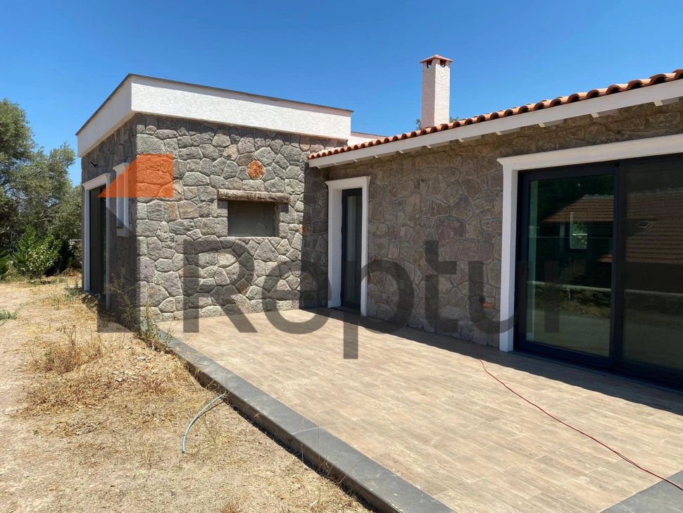 Cottage in a modern interior made of natural stone in Bodrum